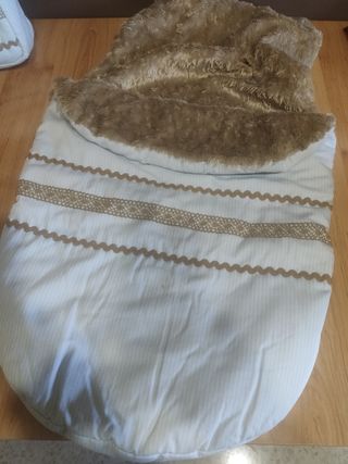 Sacó de invierno y bolso para silleta