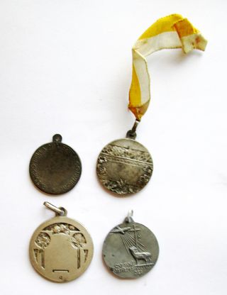 Num. 4 medaglie devozionali con diversi Santi