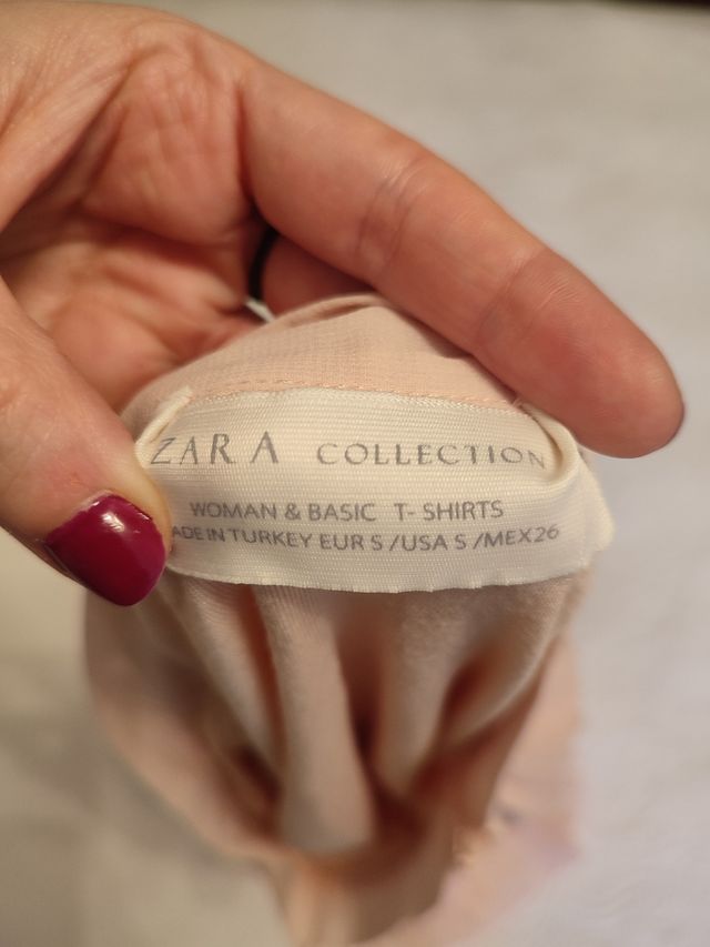 Falda plisada rosa Zara - asimétrica