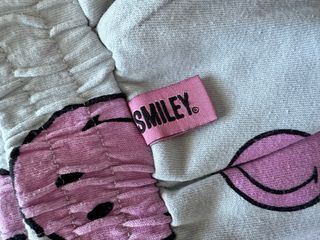 Pantalones deportivos smiley