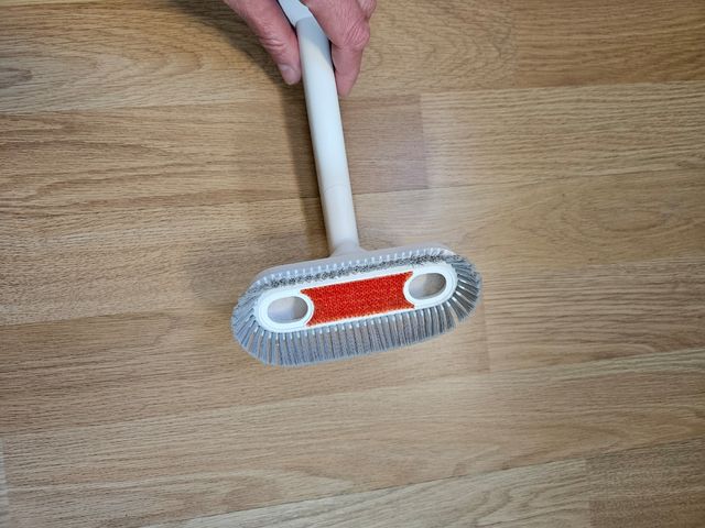 Cabezal de cepillo de eliminacion de polvo