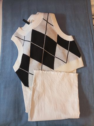 Conjunto pantalón blanco,chaleco
y camiseta negra