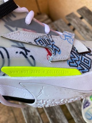 JORDAN WHY NOT ZERO.4 covered in graffiti