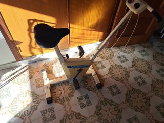 Bicicleta estatica vintage con remo