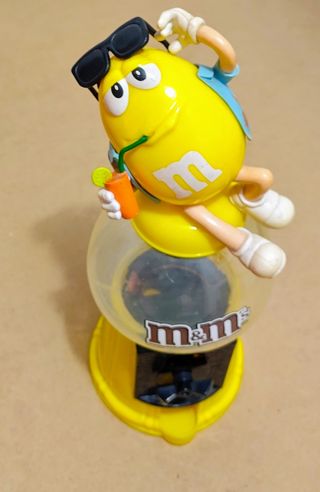 Antiguo dispensador golosinas M and Ms