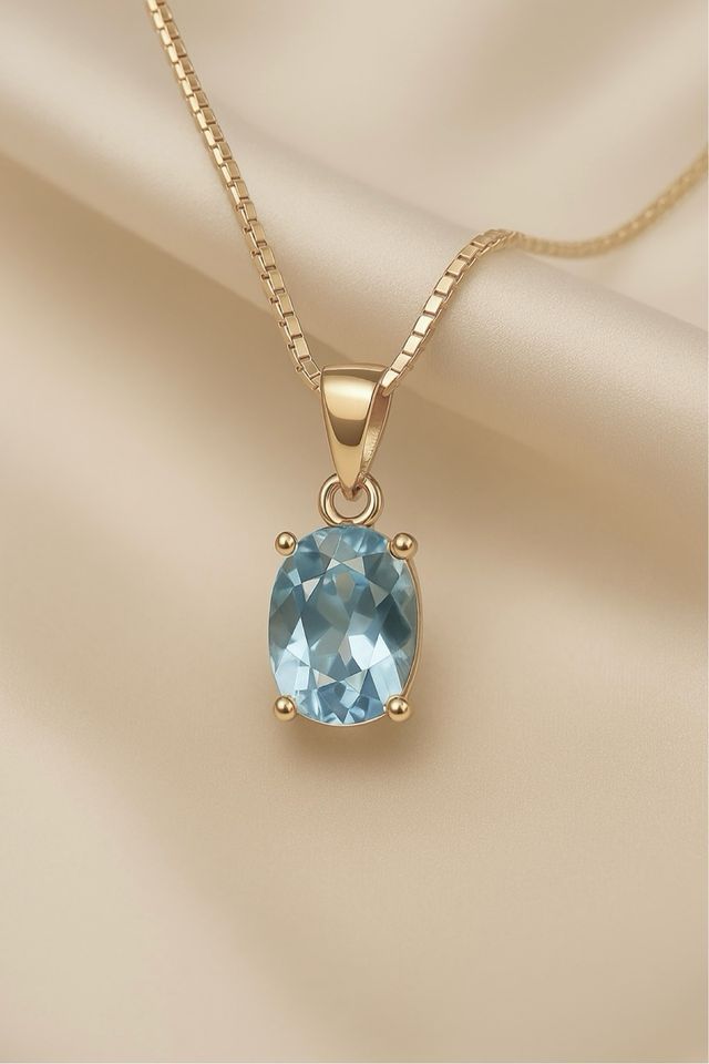 Colgante Exclusivo de Plata de Ley Chapado en Oro con Aguamarina  Elegancia y Energía Positiva