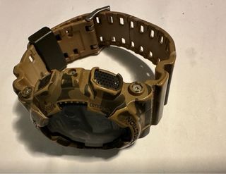 RELOJ CASIO G SHOCK GD 120 OLIVA Y MARRON.