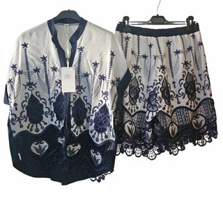 Conjunto dos piezas broderie