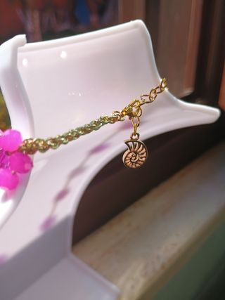 Collana fiori cristalli rosa viola