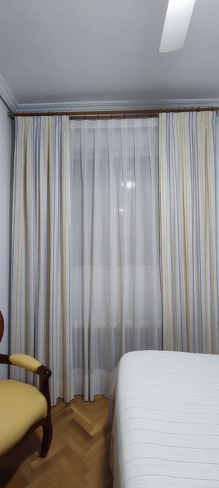 Juego de colcha y cortinas