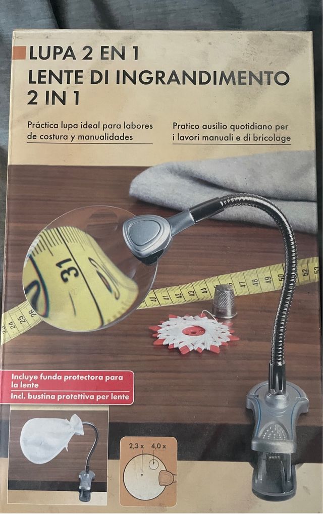 Lupa con pinza y lente