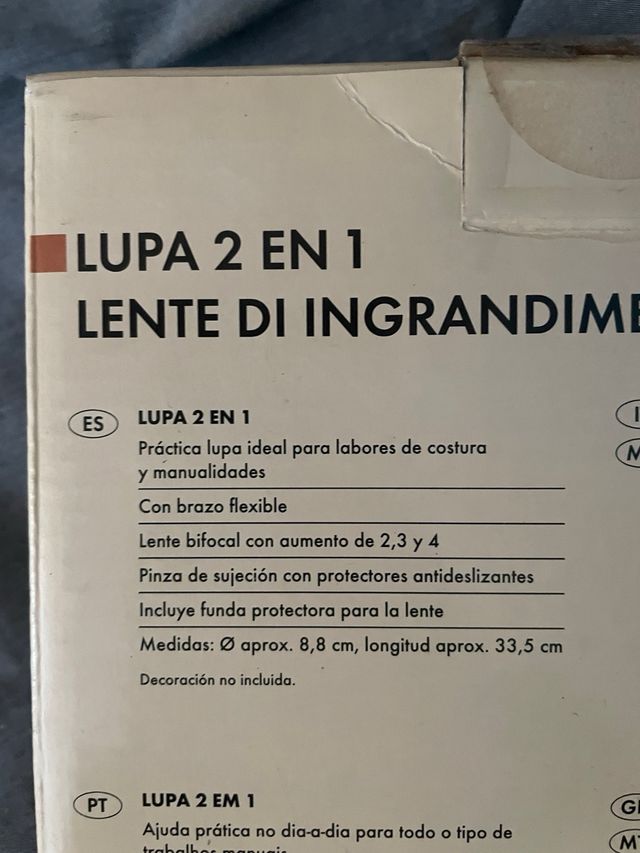 Lupa con pinza y lente