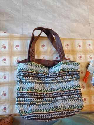 Bolso de tela con asas de cuero