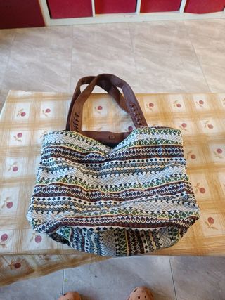 Bolso de tela con asas de cuero