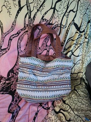 Bolso de tela con asas de cuero