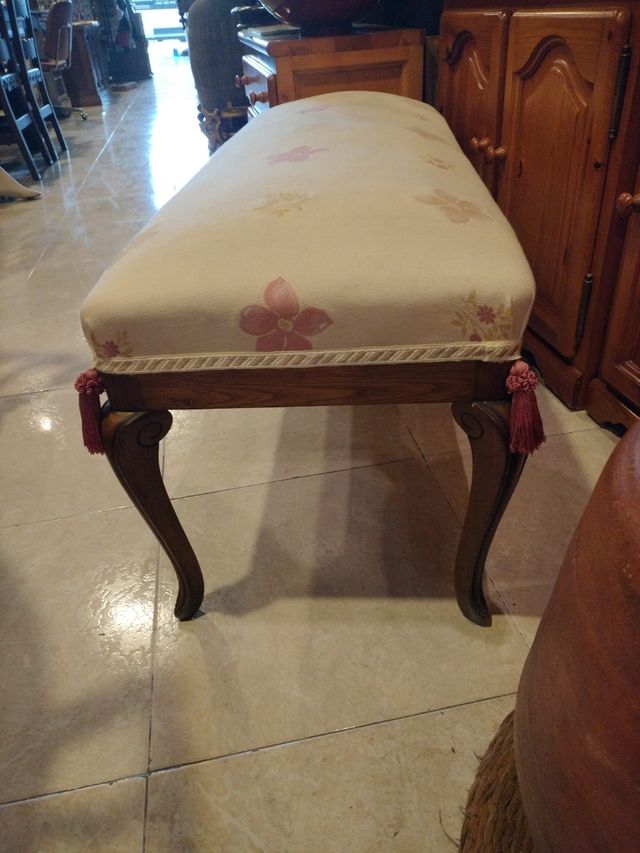 Banco tapizado antiguo