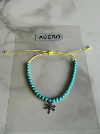Pulsera de bolas turquesa y libelula de acero