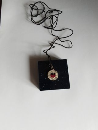 Collane ciondolo coccinella fiore