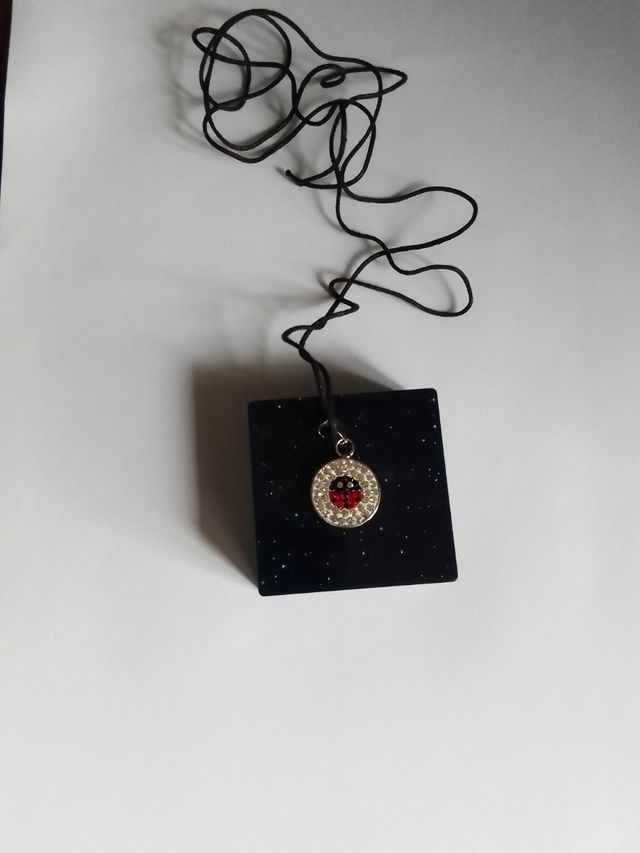 Collane ciondolo coccinella fiore