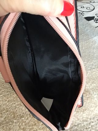 Monedero Guess rosa y porta movil