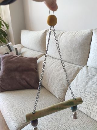 Columpio madera pájaros