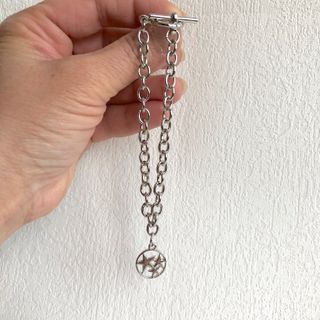 Braccialetto a catena e charm stelle