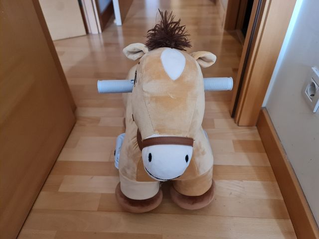 Caballito eléctrico infantil