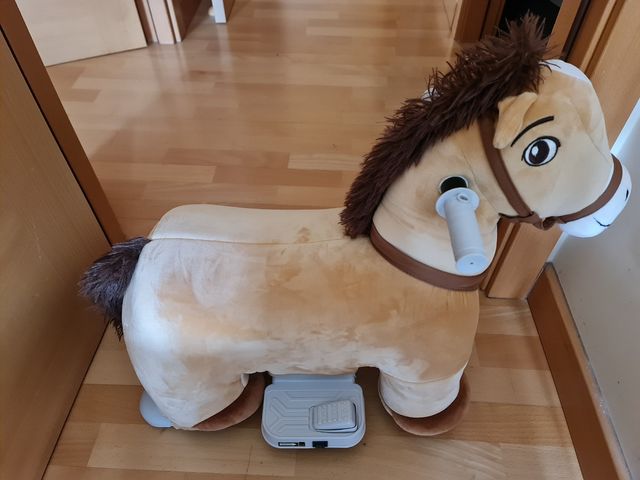 Caballito eléctrico infantil