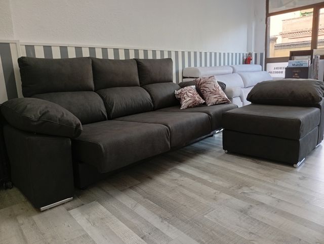 Sofá Cama con pouf movible.