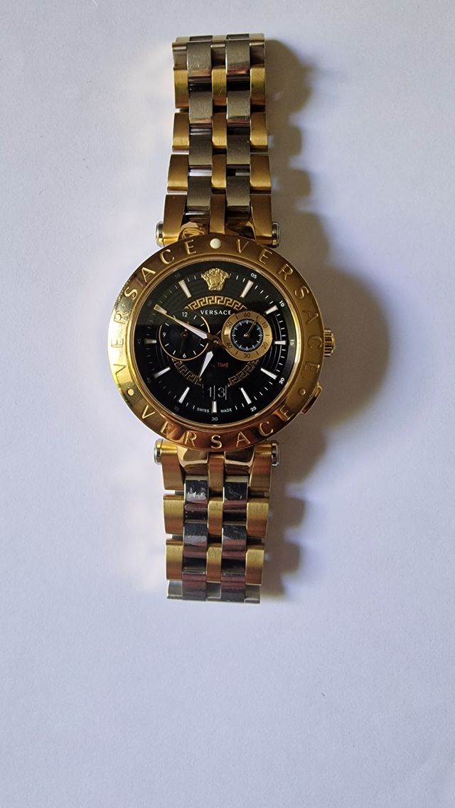 Reloj Original Versace dorado y plateado
