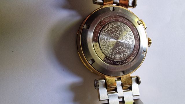 Reloj Original Versace dorado y plateado