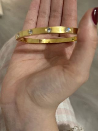 Pulsera Lotus dorada con circonitas
