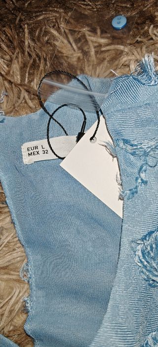 Blusa turquesa flocada talla L