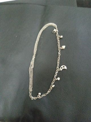 Tobillera de plata y acero