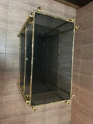 Mesa de salon de cristal y metal