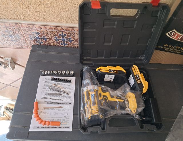 Trapano a percussione con 2 batterie