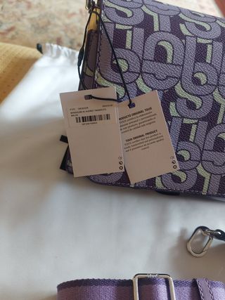 Bolso tous malva. 