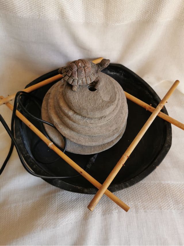 Fuente de agua con tortuga