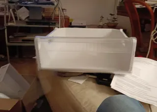 Totalmente negociable.Cajón medio frigoríf