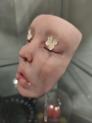 Escultura figura cara arcilla artista