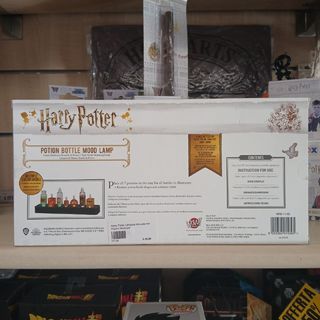 Lampada con bottiglie di pozioni del Professor