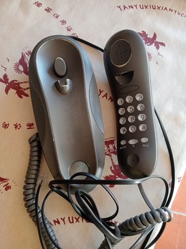 Teléfono telecom gris