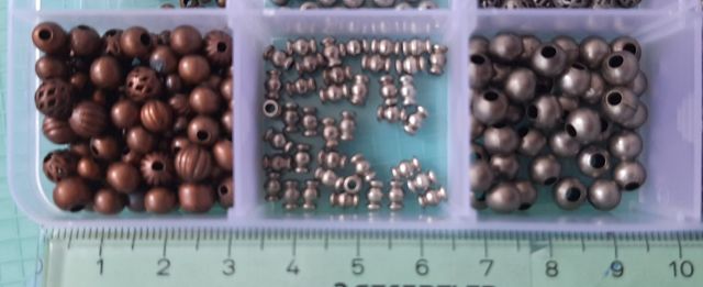 Abalorios de metal color plata, bronce, cobre