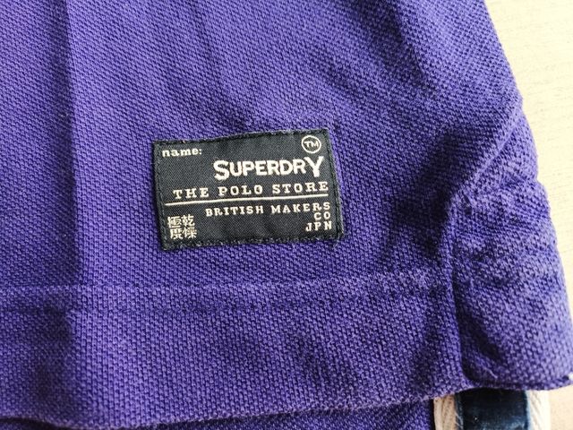 Polo viola Superdry

Scegli un look clas