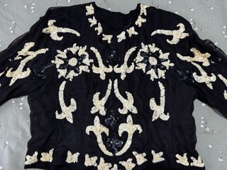 Top negro lentejuelas