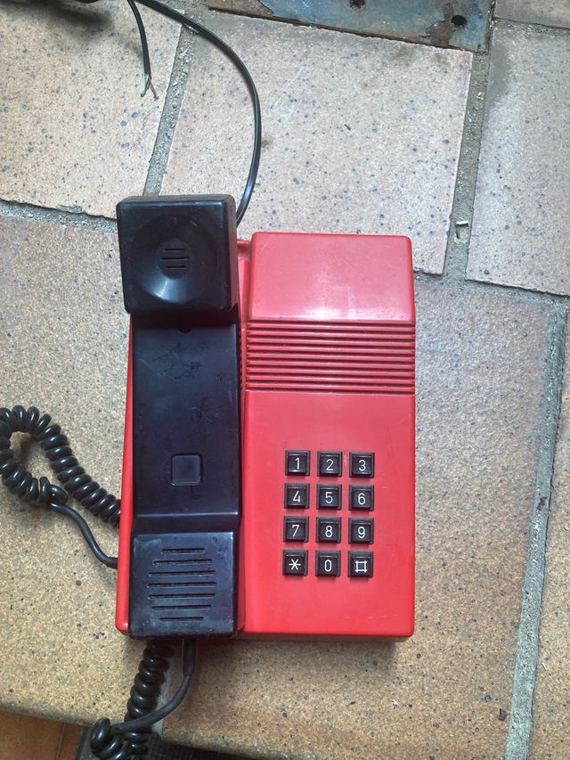 Teléfono Telefónica rojo antiguo