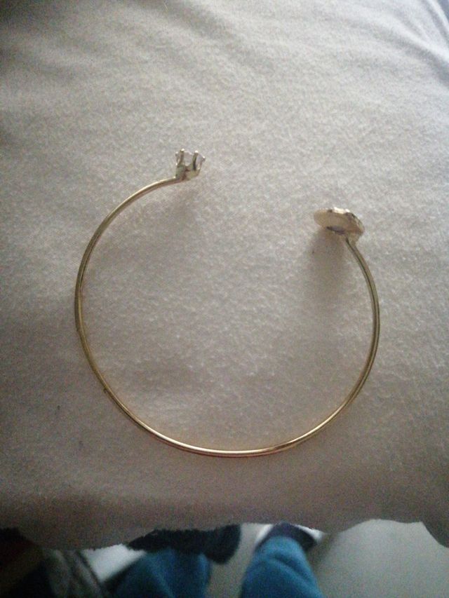 Bracciale rigido oro con cuore viola