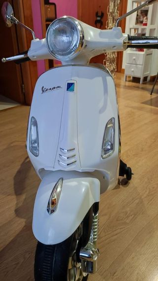 Bicicleta vespa piatgo electrica para niños