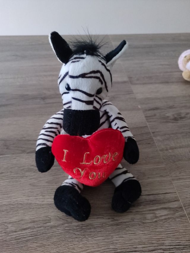 11 Peluche Animali vario tipo.