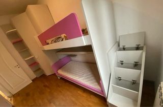 Letti a castello con cabina armadio.